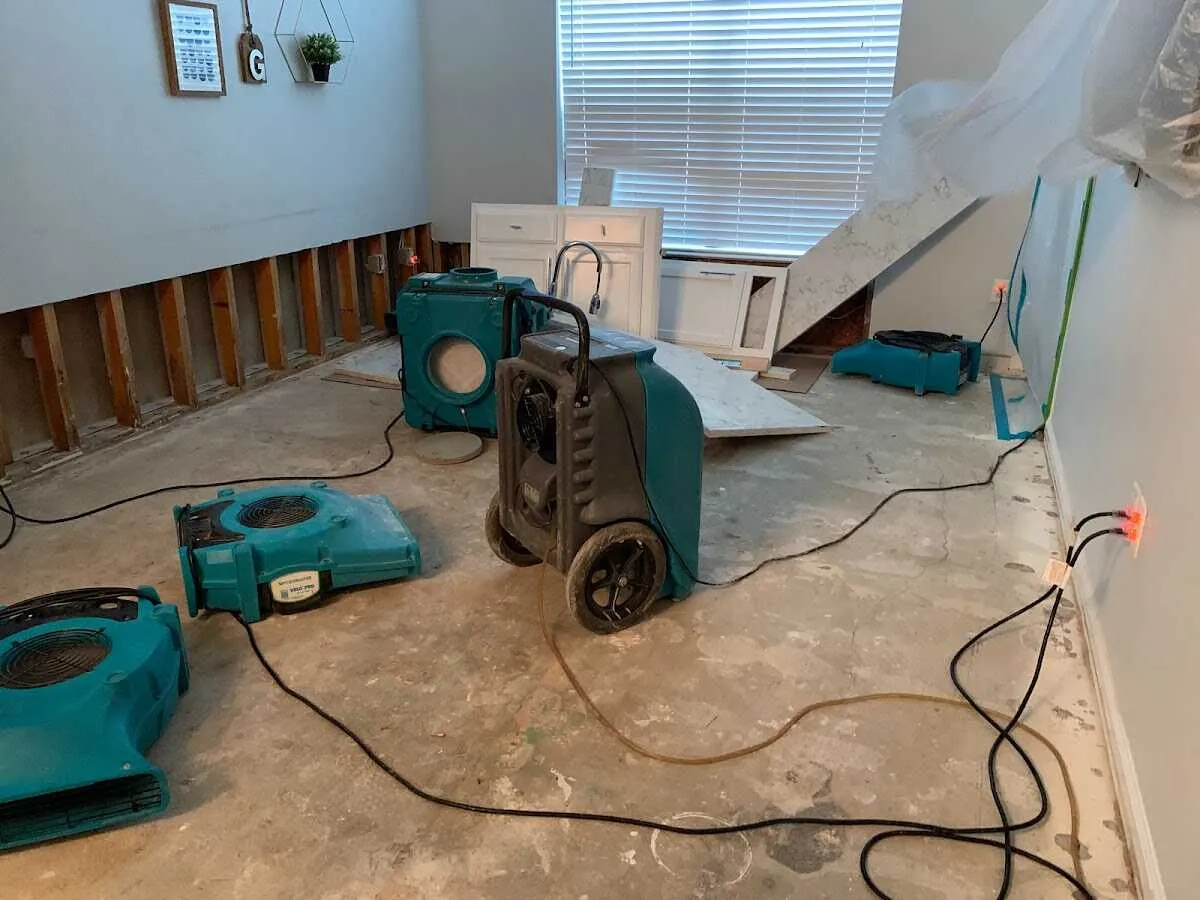 Dehumidifier in flood-cut room for Water Damage Restoration in Hillsdale